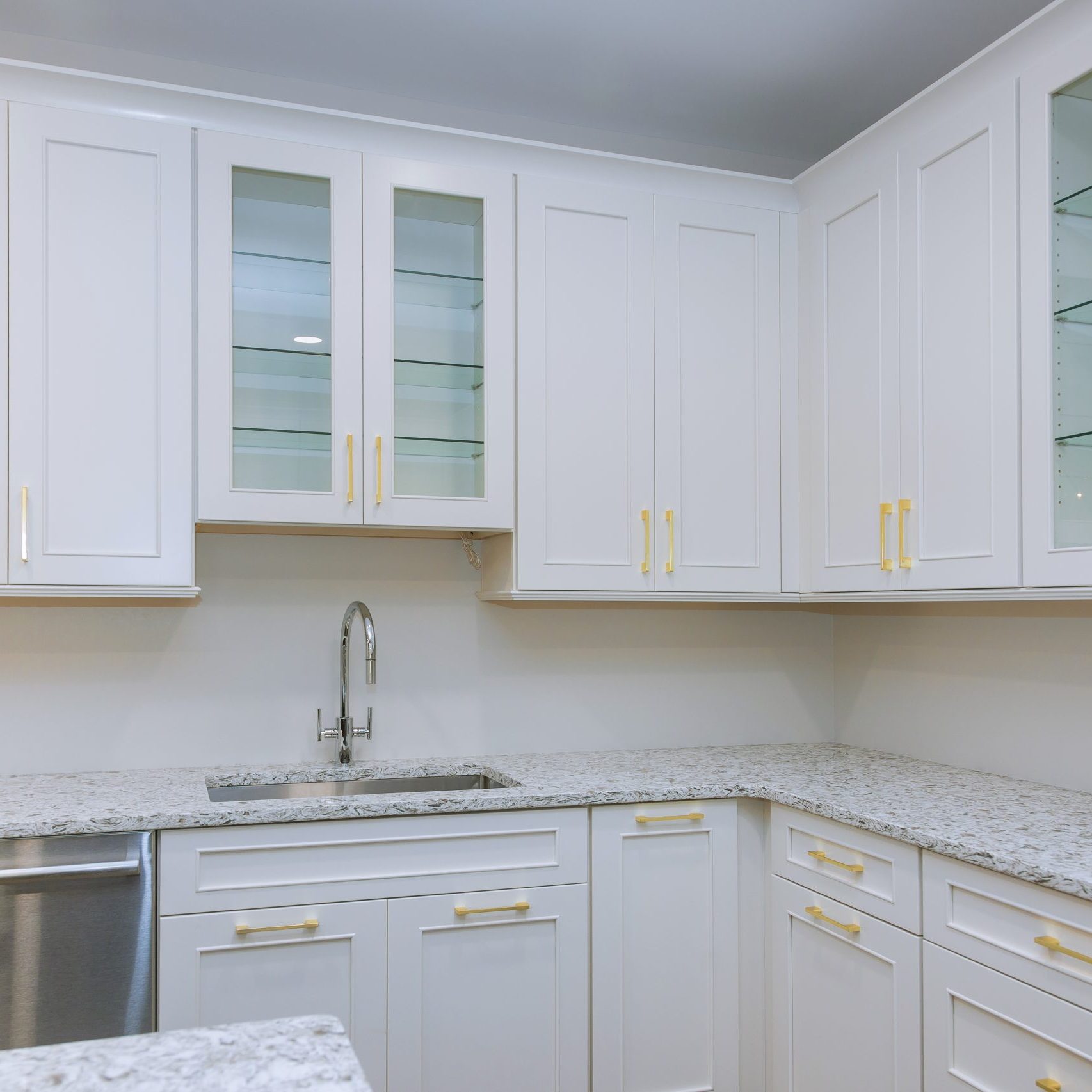 Professional white kitchen cabinet painting and refinishing services in Jacksonville Beach, FL.