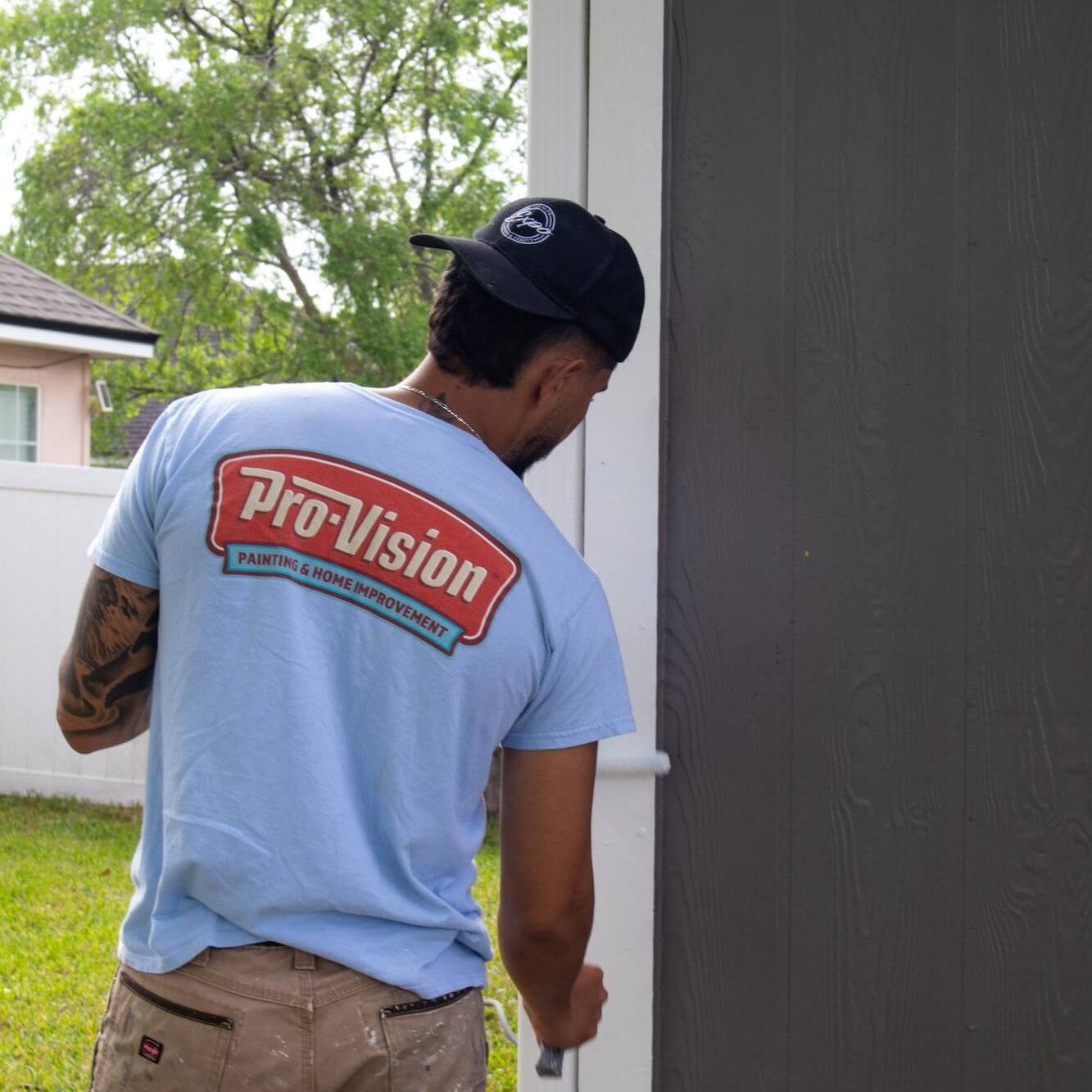 pro-vision painting team member painting home trim